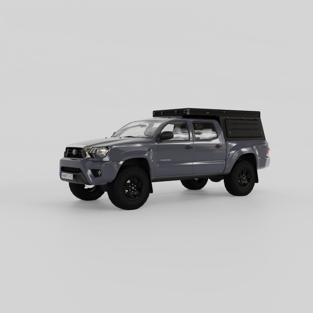 Front three-quarter view of Inca4x4 Tacoma pop-up truck camper