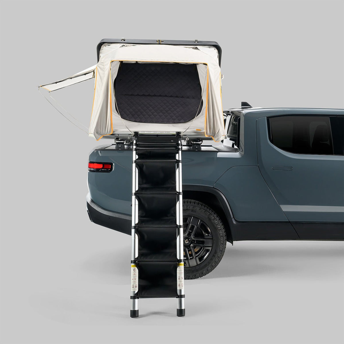 Rivian R1T with iKamper Skycamp 4.0 DLX Duo rooftop tent and HC Staircase ladder