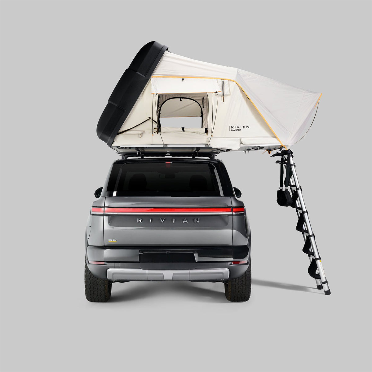 Rivian x iKamper Skycamp 4.0 DLX Trio hard shell rooftop tent on Rivian R2 for overlanding camping