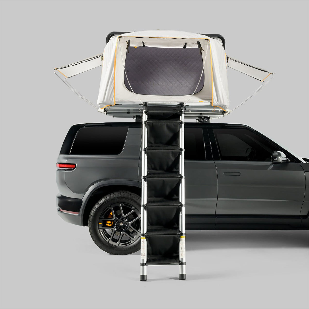Rivian R1S with iKamper Skycamp 4.0 DLX Trio rooftop tent and HC Staircase ladder