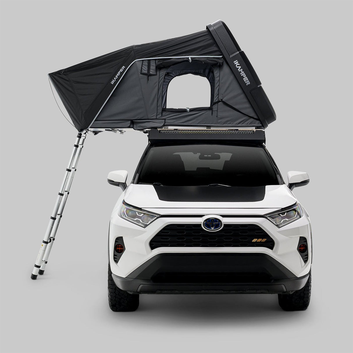 iKamper Skycamp 4.0 Trio front view open rooftop tent on overland SUV