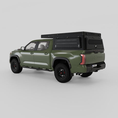Rear three-quarter view of Inca4x4 Toyota Tundra aluminum camper in travel position