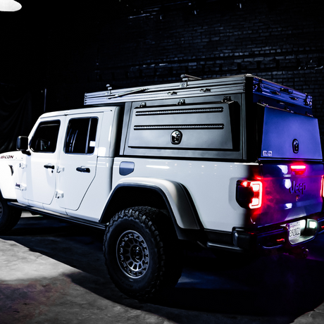 Inca4x4 Jeep Gladiator aluminum camper closed in low-profile travel position