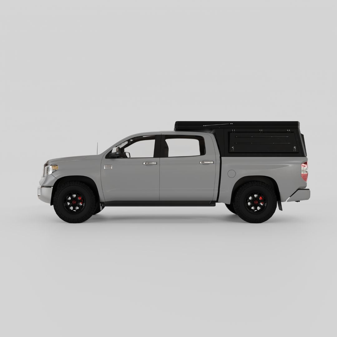 Toyota Tundra with Inca4x4 aluminum wedge camper in travel position