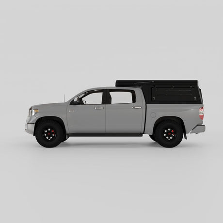 Toyota Tundra with Inca4x4 aluminum wedge camper in travel position