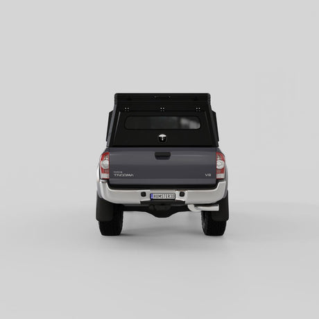 Rear view of Inca4x4 Tacoma aluminum camper closed