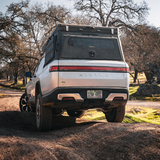 Side view of Inca4x4 pop-up camper mounted on Rivian R1T