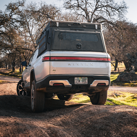 Side view of Inca4x4 pop-up camper mounted on Rivian R1T