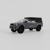 Front three-quarter view of Inca4x4 Tacoma pop-up truck camper