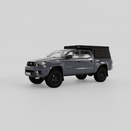 Front three-quarter view of Inca4x4 Tacoma pop-up truck camper