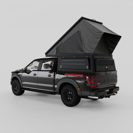 Ford F-150 with Inca4x4 wedge camper in travel position