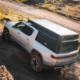 Low-profile aluminum truck camper for Rivian R1T electric truck