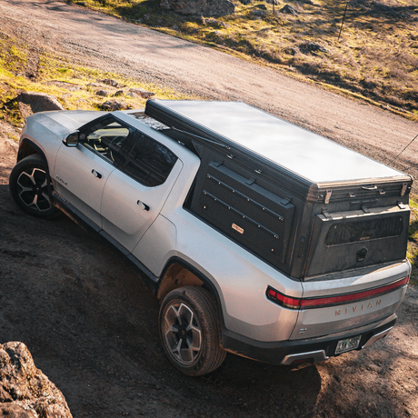 Low-profile aluminum truck camper for Rivian R1T electric truck