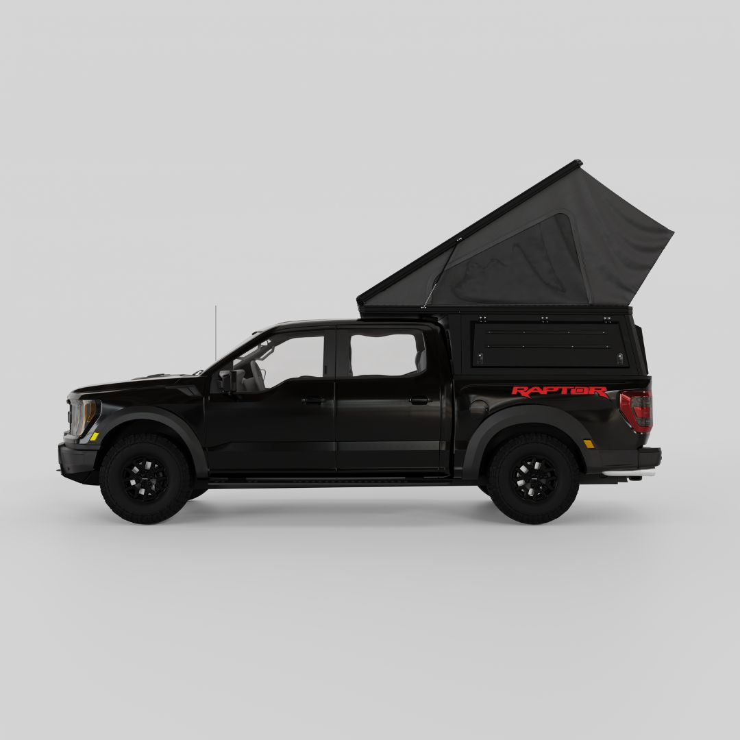 Rear view of Ford Raptor with Inca4x4 pop-up truck camper
