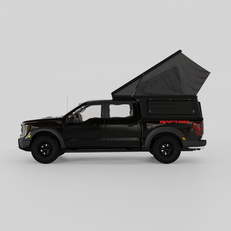 Rear view of Ford Raptor with Inca4x4 pop-up truck camper