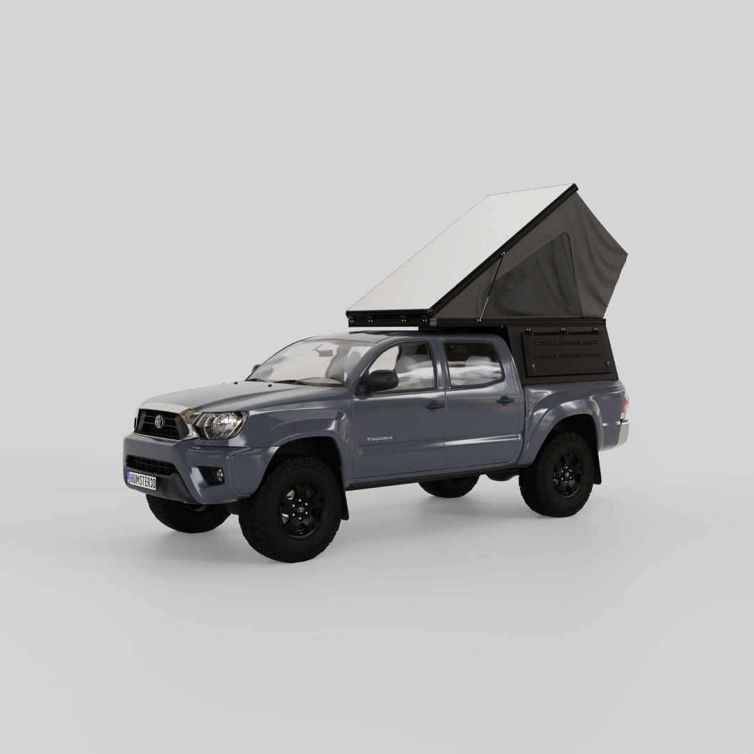 Front view of Inca4x4 wedge camper open on second-generation Toyota Tacoma