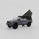 Front view of Inca4x4 wedge camper open on second-generation Toyota Tacoma