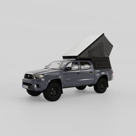 Front view of Inca4x4 wedge camper open on second-generation Toyota Tacoma