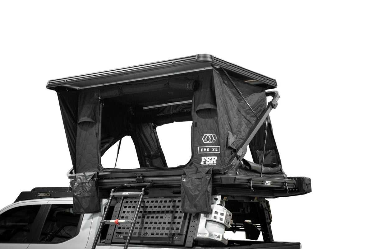 Free Spirit Recreation FSR Evolution XL hard shell rooftop tent mounted on overland truck