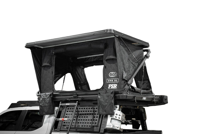 Free Spirit Recreation FSR Evolution XL hard shell rooftop tent mounted on overland truck