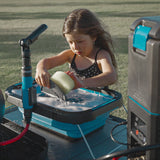 Joolca HOTTAP Go portable camp shower used for washing dishes outdoors