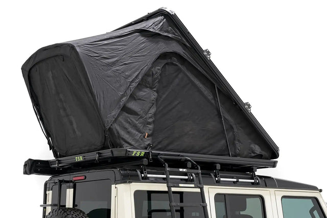Free Spirit Recreation FSR Aspen Pro XL low profile hard shell rooftop tent on SUV