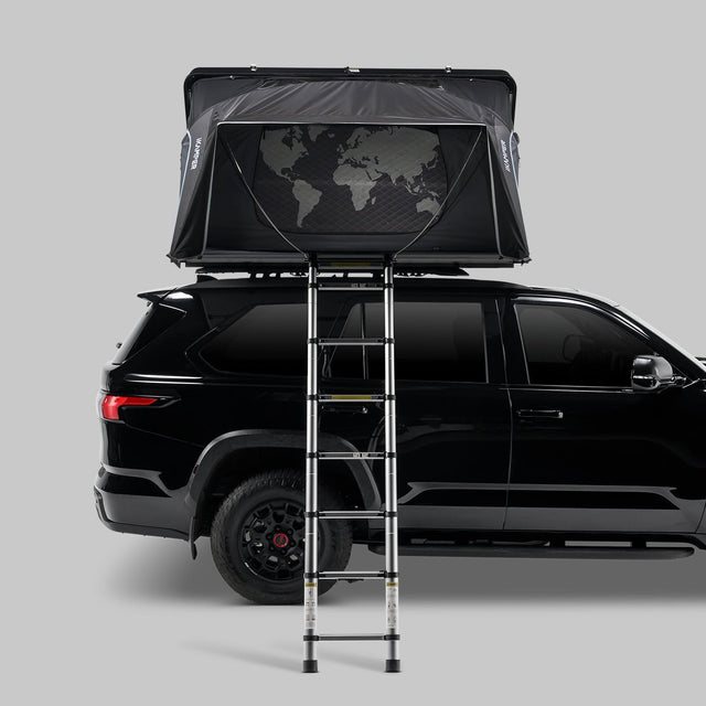 iKamper Skycamp 4.0 Quad hard shell rooftop tent open on black SUV