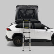 iKamper Skycamp 4.0 Trio hard shell rooftop tent open on white SUV